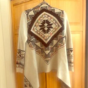 Colorful tribal design on back sweater
